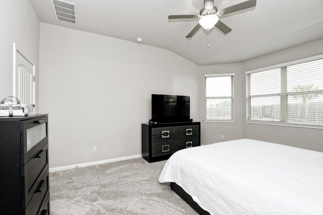 5741 Porano Cir, Round Rock, TX 78665 - bedroom featuring light colored carpet, vaulted ceiling, and a ceiling fan
