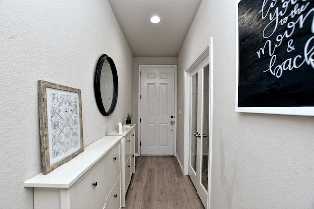 5741 Porano Cir, Round Rock, TX 78665 - doorway with french doors, wood finished floors, a textured wall, and recessed lighting