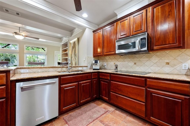 6425 Yaupon Dr, Austin, TX 78759 - kitchen with stainless steel appliances, ceiling fan, tasteful backsplash, ornamental molding, and light stone countertops