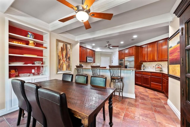 6425 Yaupon Dr, Austin, TX 78759 - dining space with a ceiling fan, crown molding, recessed lighting, a tray ceiling, and stone finish flooring