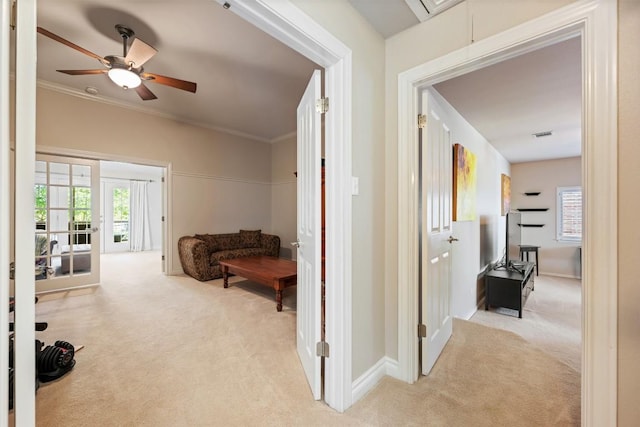 6425 Yaupon Dr, Austin, TX 78759 - hallway with carpet, attic access, healthy amount of natural light, and crown molding