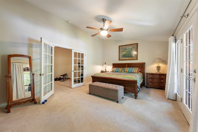 6425 Yaupon Dr, Austin, TX 78759 - carpeted bedroom featuring french doors, multiple windows, and a ceiling fan