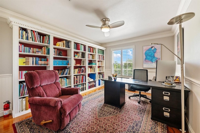 6425 Yaupon Dr, Austin, TX 78759 - office with ceiling fan, wood finished floors, ornamental molding, and a wainscoted wall