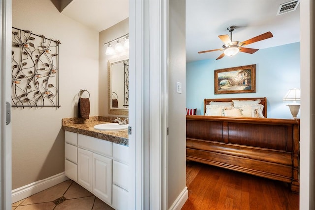 6425 Yaupon Dr, Austin, TX 78759 - bathroom featuring vanity and a ceiling fan