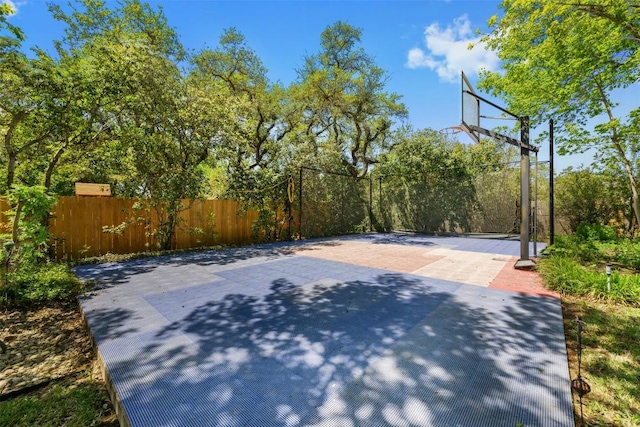 6425 Yaupon Dr, Austin, TX 78759 - view of basketball court featuring fence and basketball court