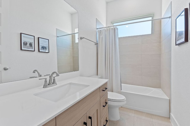 bathroom with tile patterned floors, shower / tub combo with curtain, vanity, and toilet