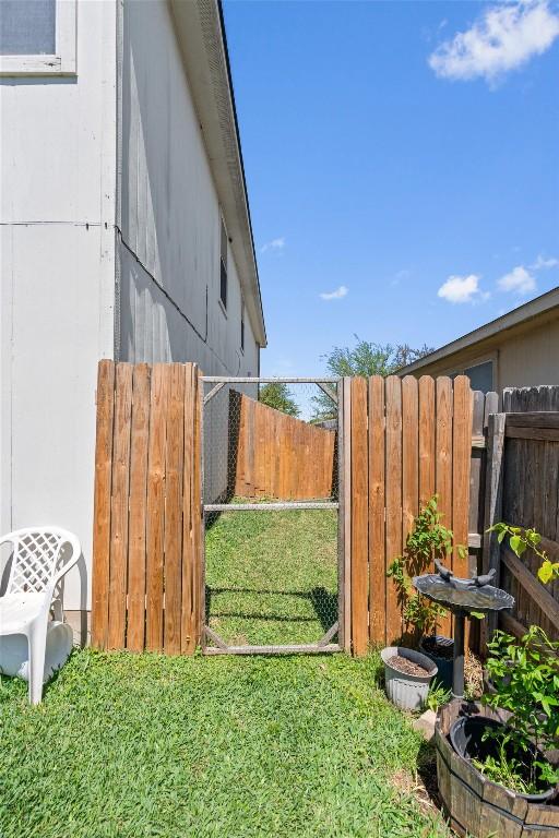 12833 Carillon Way, Manor, TX 78653 - view of yard featuring fence
