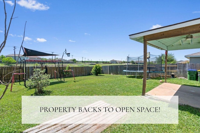 12833 Carillon Way, Manor, TX 78653 - view of yard with a trampoline, a playground, and a patio
