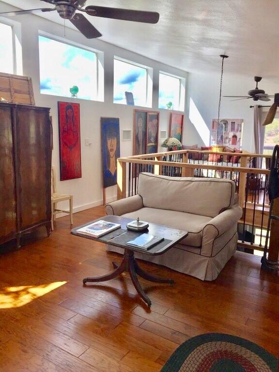 156 Lazy Leaf Ln, Wimberley, TX 78676 - living area featuring ceiling fan and hardwood / wood-style floors