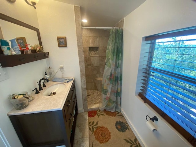 156 Lazy Leaf Ln, Wimberley, TX 78676 - bathroom with vanity and tiled shower