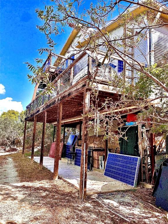 156 Lazy Leaf Ln, Wimberley, TX 78676 - view of side of property featuring a wooden deck