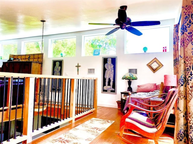 156 Lazy Leaf Ln, Wimberley, TX 78676 - living area with ceiling fan and wood finished floors