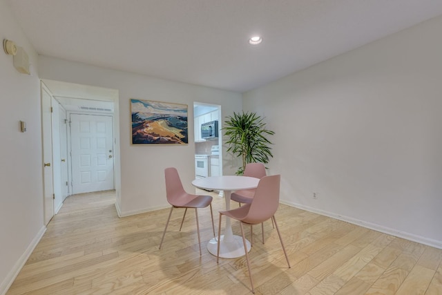 9226 Jollyville Rd Unit 132, Austin, TX 78759 - dining room with light wood finished floors, baseboards, and recessed lighting