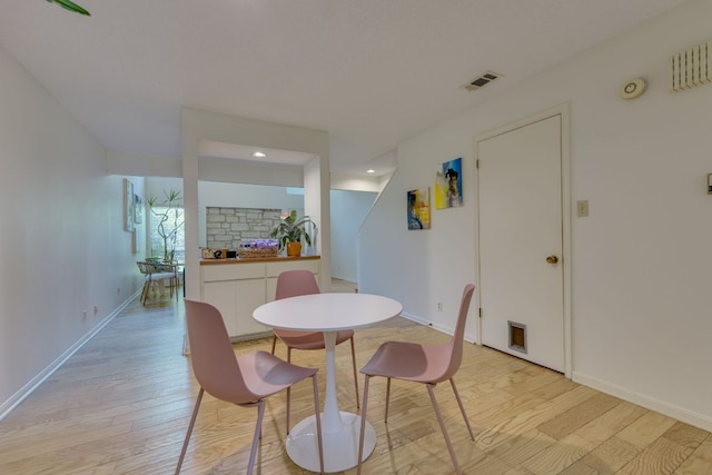 9226 Jollyville Rd Unit 132, Austin, TX 78759 - dining room with light wood-type flooring, recessed lighting, and baseboards