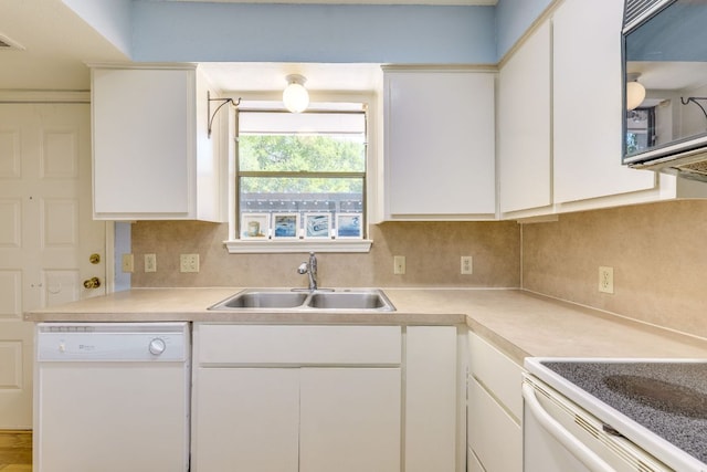 9226 Jollyville Rd Unit 132, Austin, TX 78759 - kitchen featuring white appliances, a sink, tasteful backsplash, and light countertops