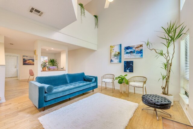 9226 Jollyville Rd Unit 132, Austin, TX 78759 - living room featuring wood finished floors and baseboards