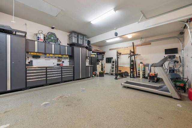 workout area featuring a garage