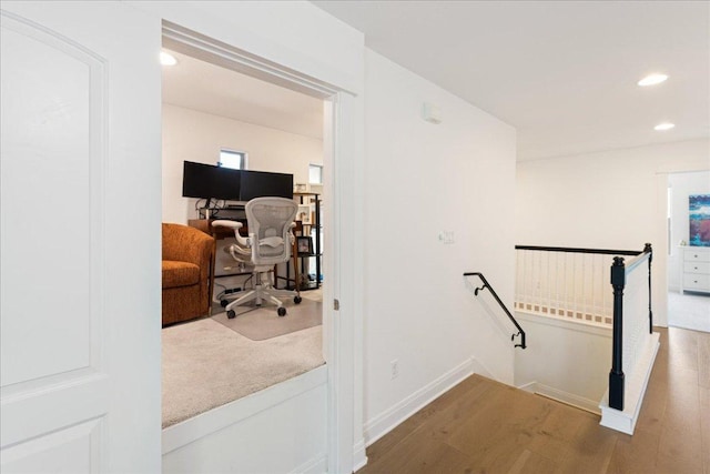 15213 Falconhead Grove Loop, Austin, TX 78738 - corridor featuring an upstairs landing, wood finished floors, recessed lighting, and baseboards