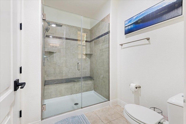 15213 Falconhead Grove Loop, Austin, TX 78738 - bathroom featuring tile patterned floors and a shower stall
