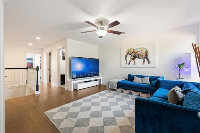 15213 Falconhead Grove Loop, Austin, TX 78738 - living area with wood finished floors, a ceiling fan, and recessed lighting