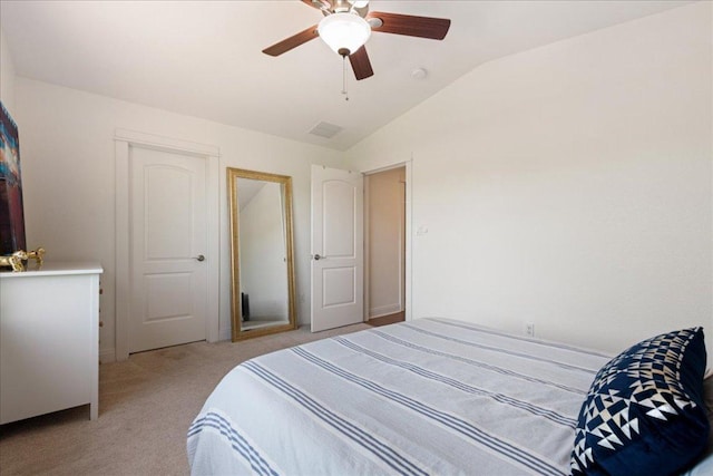 15213 Falconhead Grove Loop, Austin, TX 78738 - bedroom featuring light carpet, lofted ceiling, and ceiling fan
