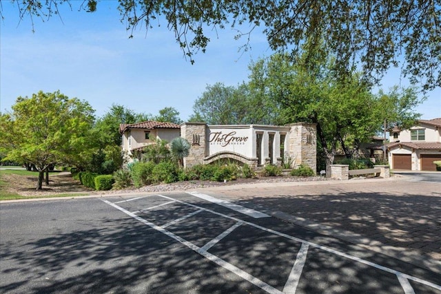 15213 Falconhead Grove Loop, Austin, TX 78738 - community sign featuring uncovered parking