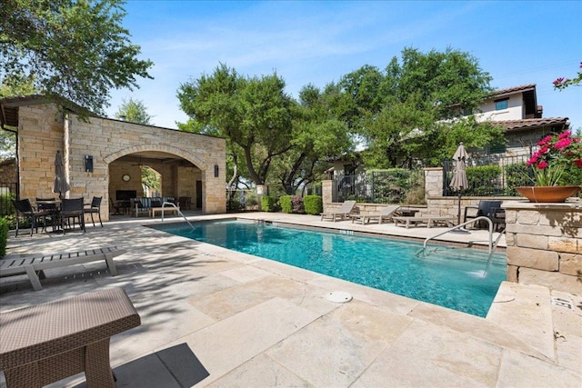 15213 Falconhead Grove Loop, Austin, TX 78738 - community pool with a patio area