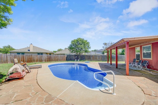view of pool featuring a fenced backyard, a fenced in pool, and a patio