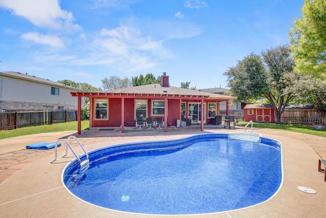 view of pool featuring a patio area, a fenced in pool, and a fenced backyard