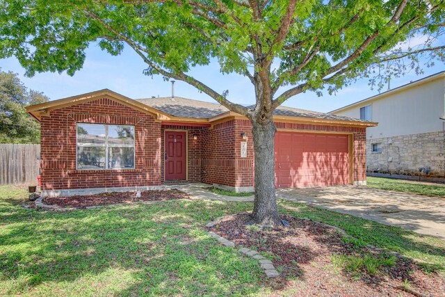ranch-style house with an attached garage, driveway, brick siding, and fence
