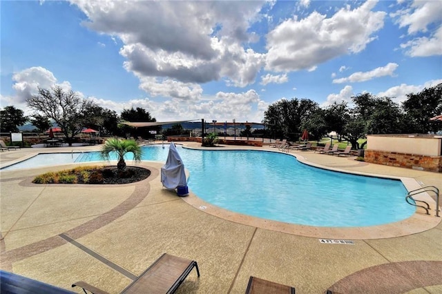 3817 Benetton Way, Leander, TX 78641 - community pool with a patio area