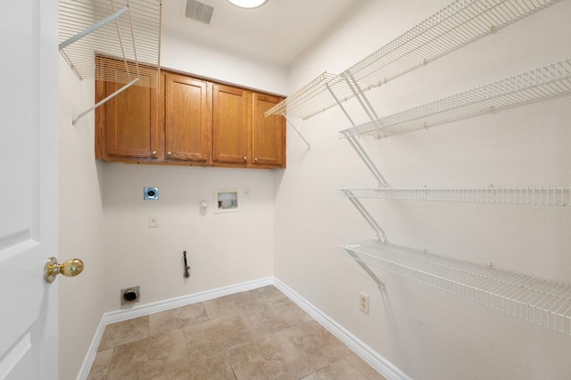 laundry room with visible vents, hookup for an electric dryer, washer hookup, hookup for a gas dryer, and cabinet space