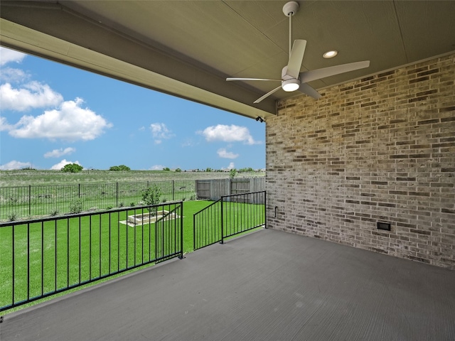 view of patio featuring ceiling fan and a fenced backyard
