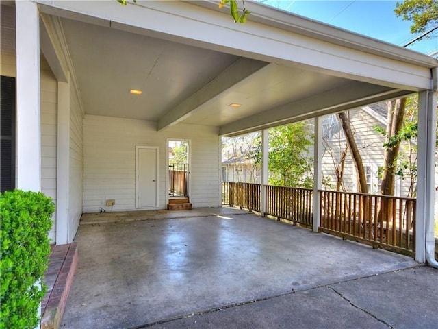 view of patio / terrace featuring a carport