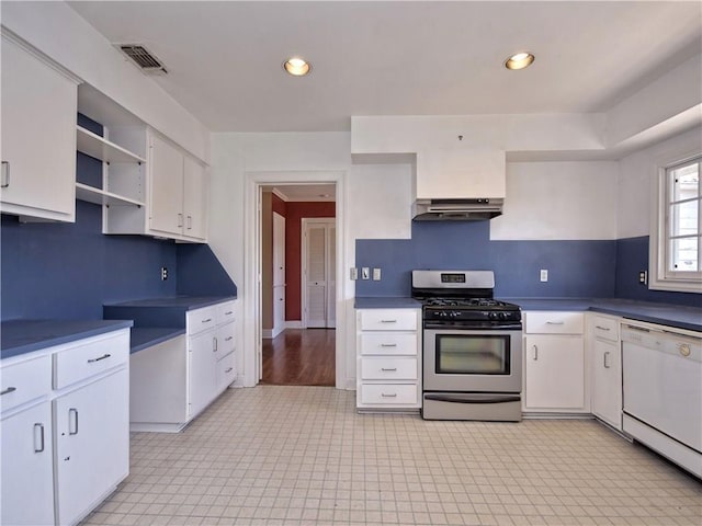 1621 Watchhill Rd, Austin, TX 78703 - kitchen featuring stainless steel gas range oven, dishwasher, under cabinet range hood, white cabinets, and open shelves