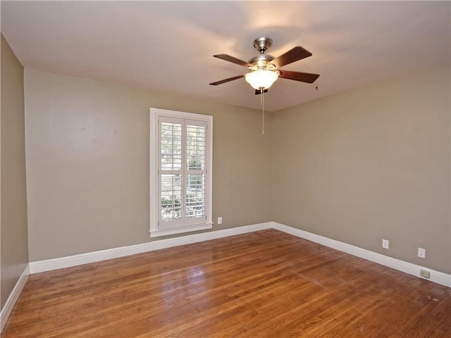 1621 Watchhill Rd, Austin, TX 78703 - spare room with wood finished floors, baseboards, and ceiling fan