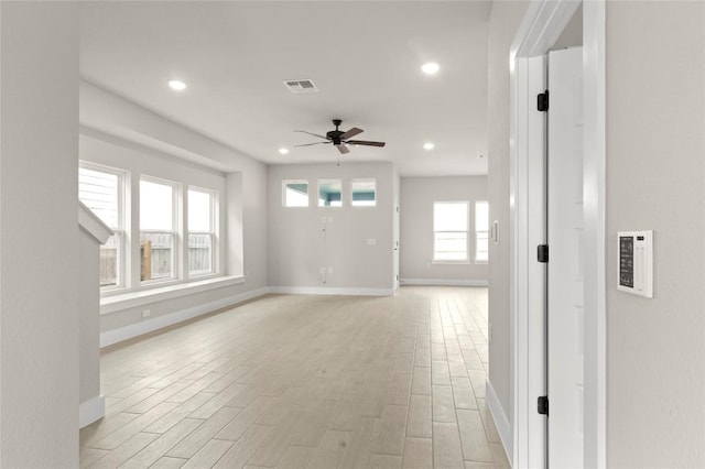 9708 Petrichor Blvd, Manor, TX 78653 - unfurnished room featuring baseboards, a ceiling fan, light wood-style flooring, and recessed lighting