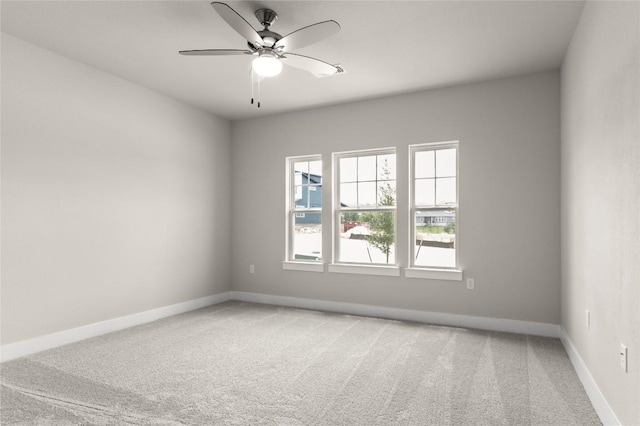9708 Petrichor Blvd, Manor, TX 78653 - empty room featuring light colored carpet, baseboards, and a ceiling fan