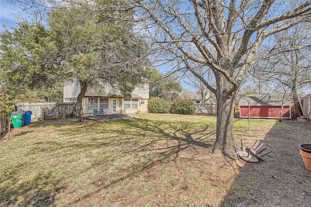 2813 Single Trace Ct, Austin, TX 78728 - view of yard featuring an outbuilding and a fenced backyard