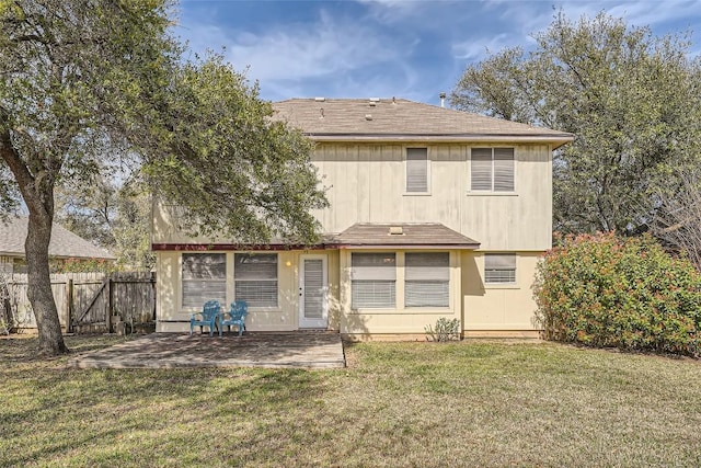 2813 Single Trace Ct, Austin, TX 78728 - rear view of house with a patio area, a shingled roof, fence, and a lawn