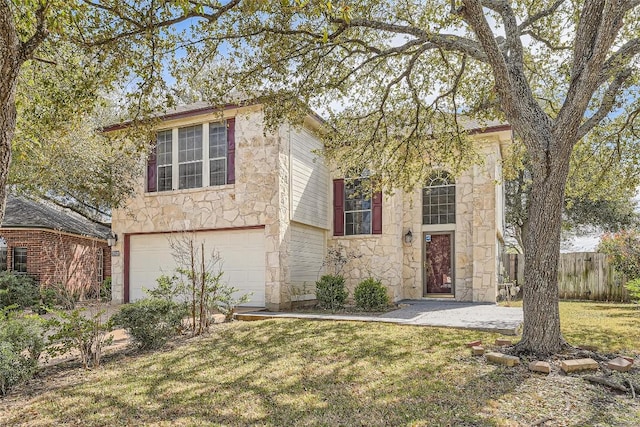 2813 Single Trace Ct, Austin, TX 78728 - view of front of property featuring a front lawn, fence, stone siding, and a garage