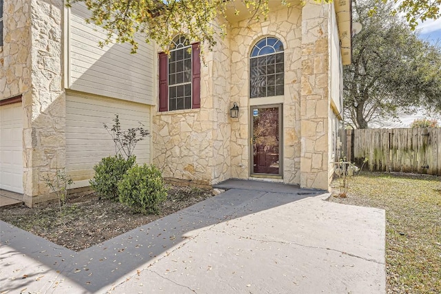 2813 Single Trace Ct, Austin, TX 78728 - view of exterior entry featuring stone siding and fence