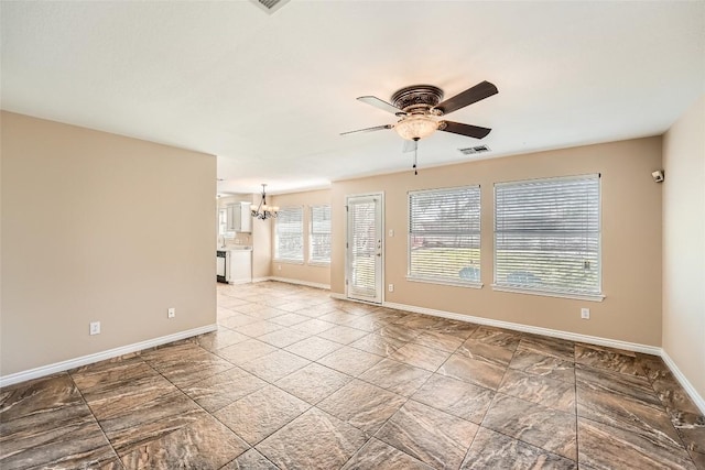 2813 Single Trace Ct, Austin, TX 78728 - unfurnished living room with visible vents, baseboards, and ceiling fan with notable chandelier