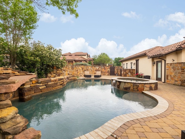 3701 Pappys Way, Austin, TX 78730 - view of swimming pool featuring a pool with connected hot tub, a patio area, and fence