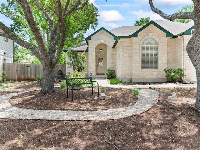 906 Woodhollow Ln, Cedar Park, TX 78613 - view of front of house featuring fence and stone siding