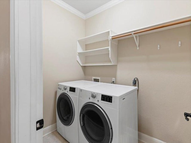 906 Woodhollow Ln, Cedar Park, TX 78613 - laundry area with laundry area, ornamental molding, baseboards, and washer and dryer