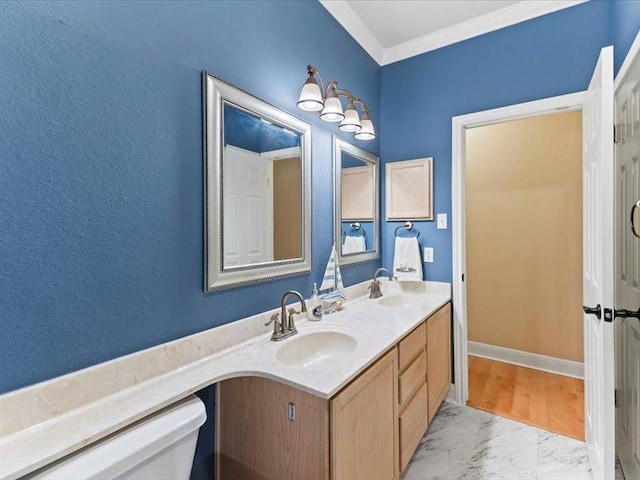 906 Woodhollow Ln, Cedar Park, TX 78613 - bathroom with crown molding, double vanity, a sink, and marble finish floor