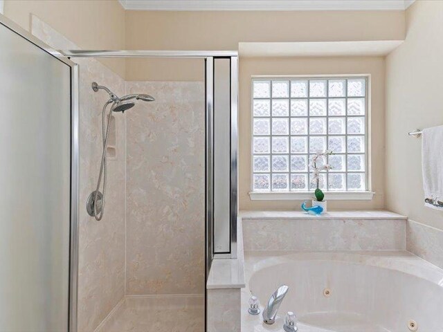 906 Woodhollow Ln, Cedar Park, TX 78613 - bathroom with ornamental molding, a whirlpool tub, and a stall shower