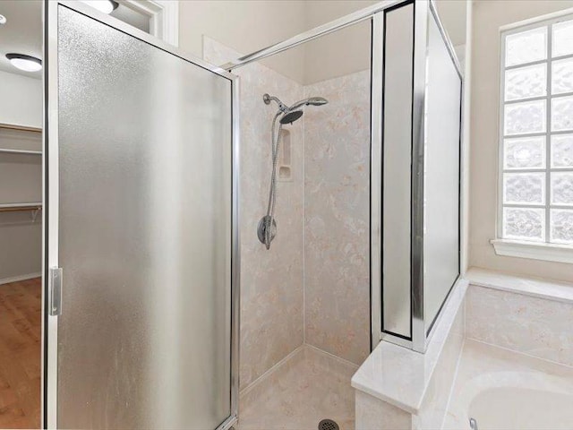 906 Woodhollow Ln, Cedar Park, TX 78613 - full bathroom featuring a stall shower and a spacious closet