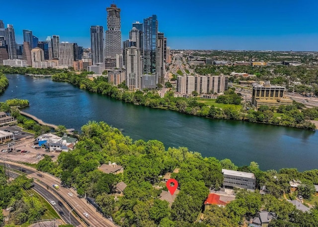 809 Edgecliff Ter, Austin, TX 78704 - drone / aerial view of skyline and a large body of water